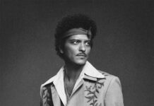Bruno Mars Milan 2026: How to Get Tickets Bruno Mars Milan 2026: How to Get Tickets - Bruno Mars official promotional portrait for The Romantic Tour, used to promote the Milan concert at Stadio San Siro on July 14, 2026.