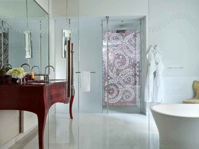 Suite bathroom at Hotel Principe di Savoia in Milan, with mosaic shower and bathtub